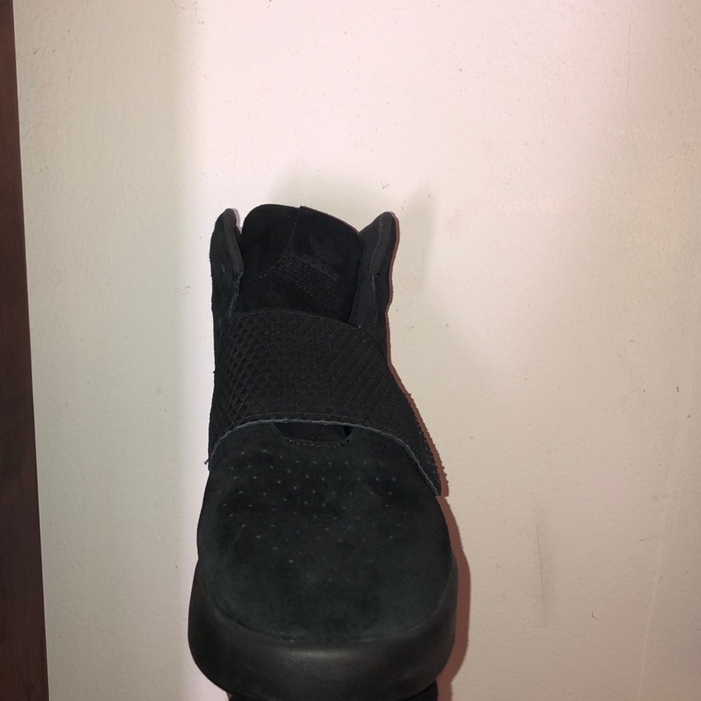 All black Adidas tubular strappy shoes